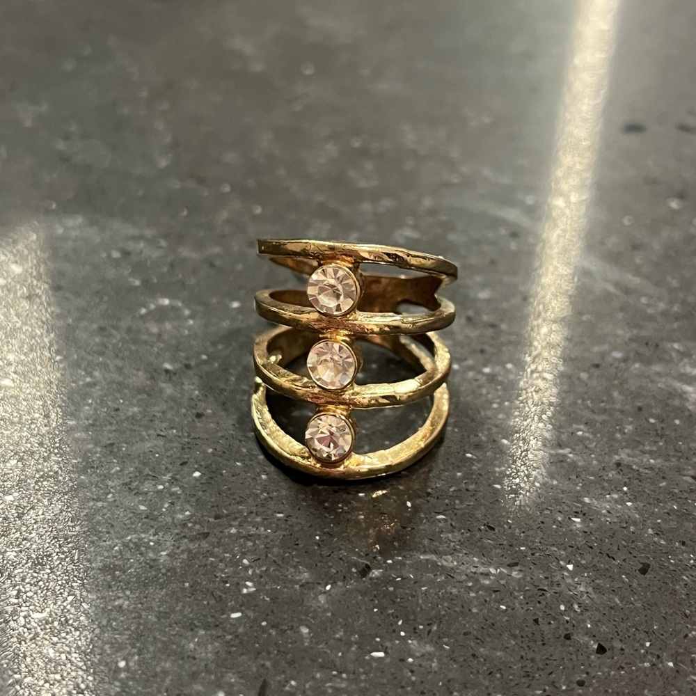 Gold guess ring